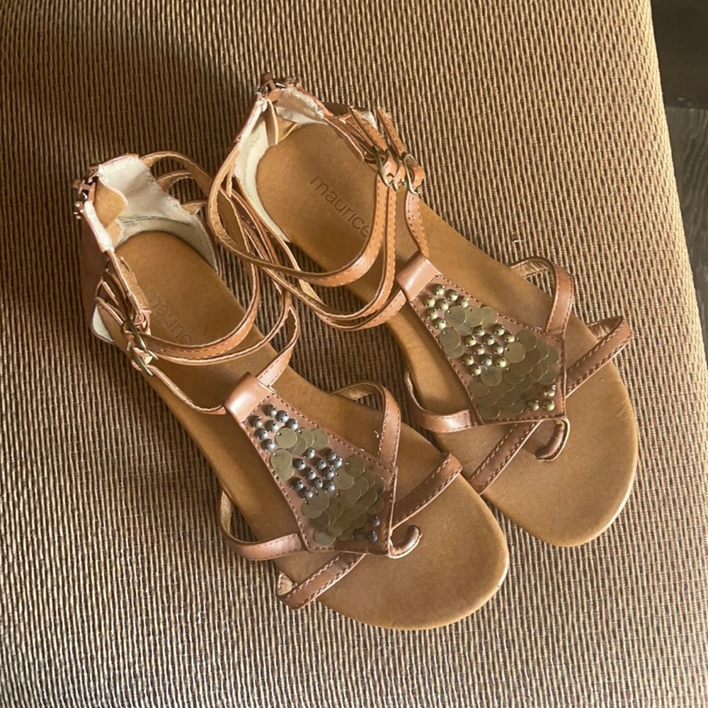 Brown strappy sandal with zipper back.